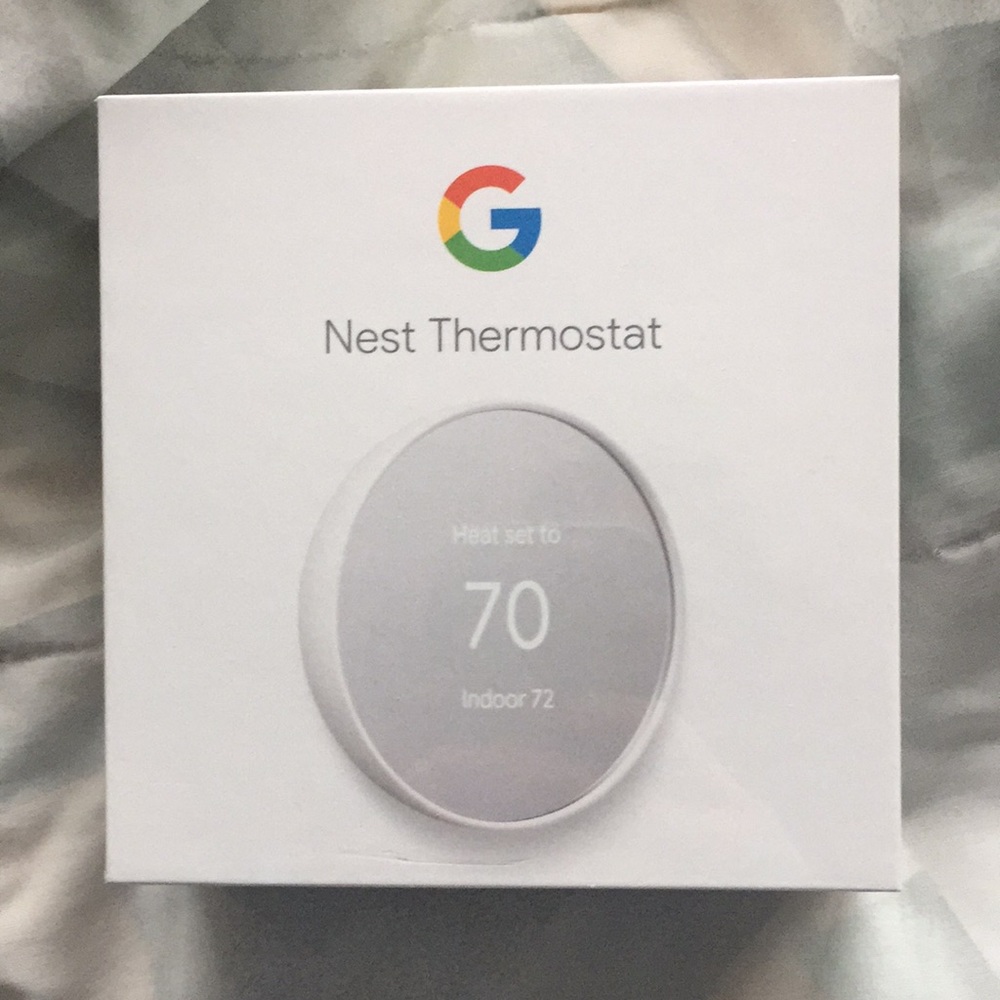 New google nest thermostat in box sealed